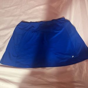 Medium blue FILA athletic skirt with built in shorts